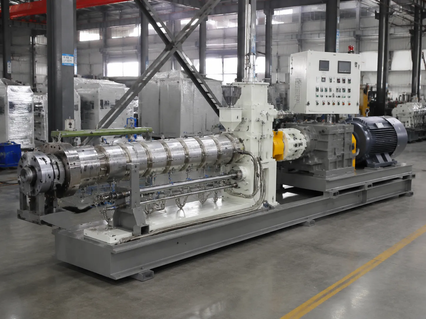 Industrial cold-feed rubber extruder machine with twin-screw design, wear-resistant barrel, multi-zone temperature control and smart HMI panel for continuous 24/7 rubber profile extrusion at UET Machine factory