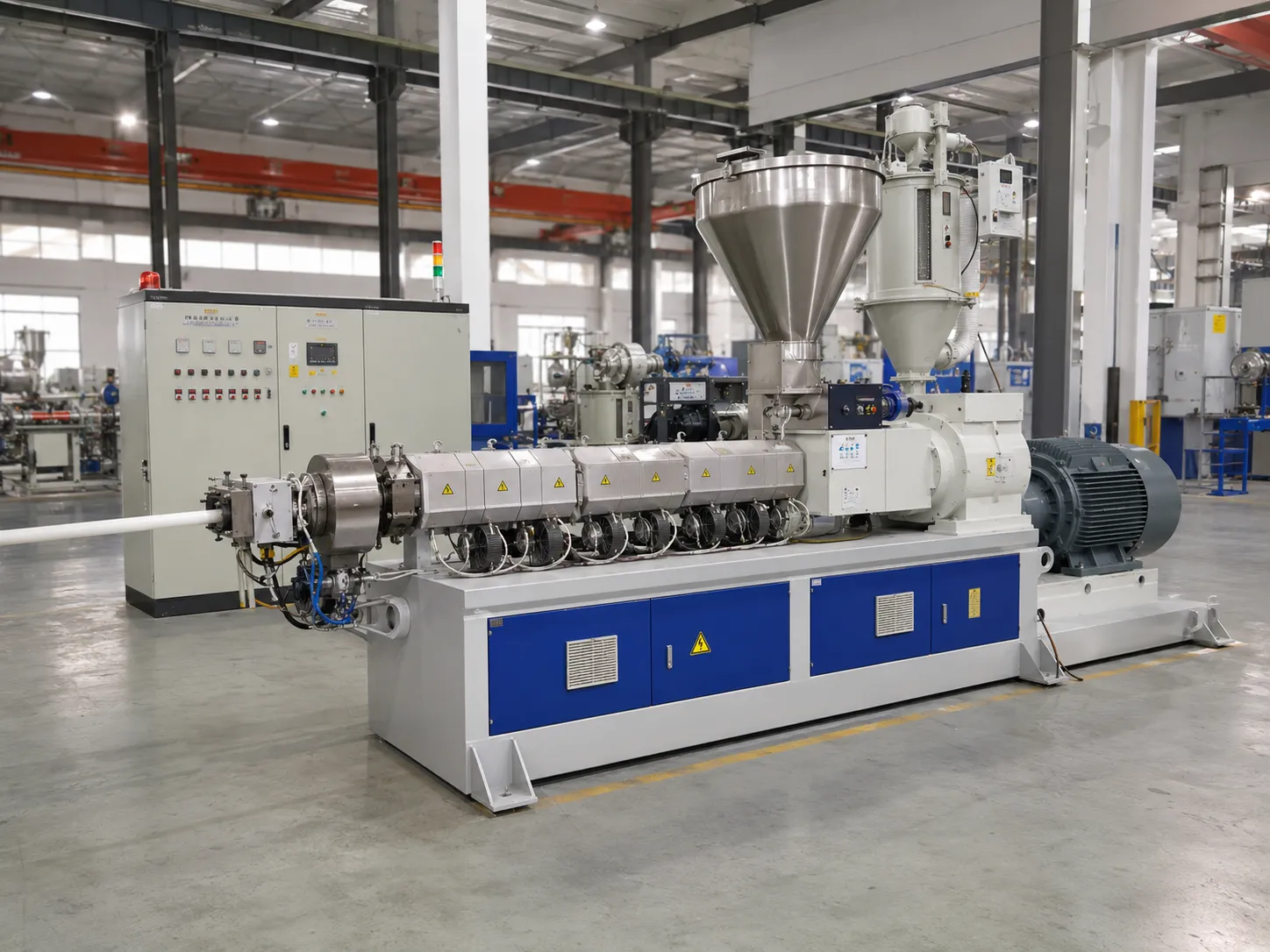 UET cost-effective single screw extruder with stainless steel hopper multi-zone heated barrel yellow high-temperature warning labels blue white base frame heavy-duty motor and gearbox independent PLC control cabinet with indicator lights producing white PVC pipe for PE PP PVC ABS pipe sheet film and profile extrusion at UET Machine factory China CE ISO 9001