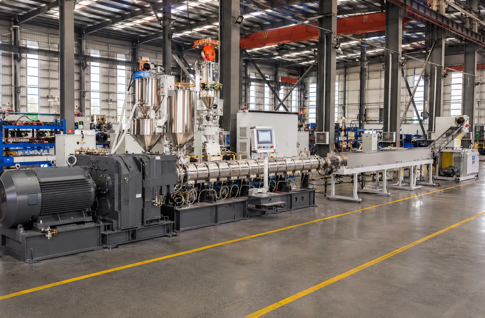 Complete engineering plastic extrusion line with twin-screw extruder, stainless steel hopper, PLC touchscreen control and cooling system for PA PC POM ABS and PBT processing at UET Machine factory