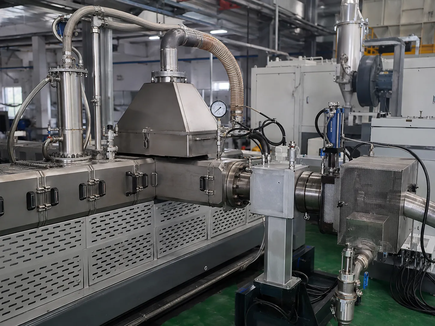 Stainless steel plastic recycling extrusion equipment with pressure gauges and temperature control piping ensuring stable and uniform extrusion performance