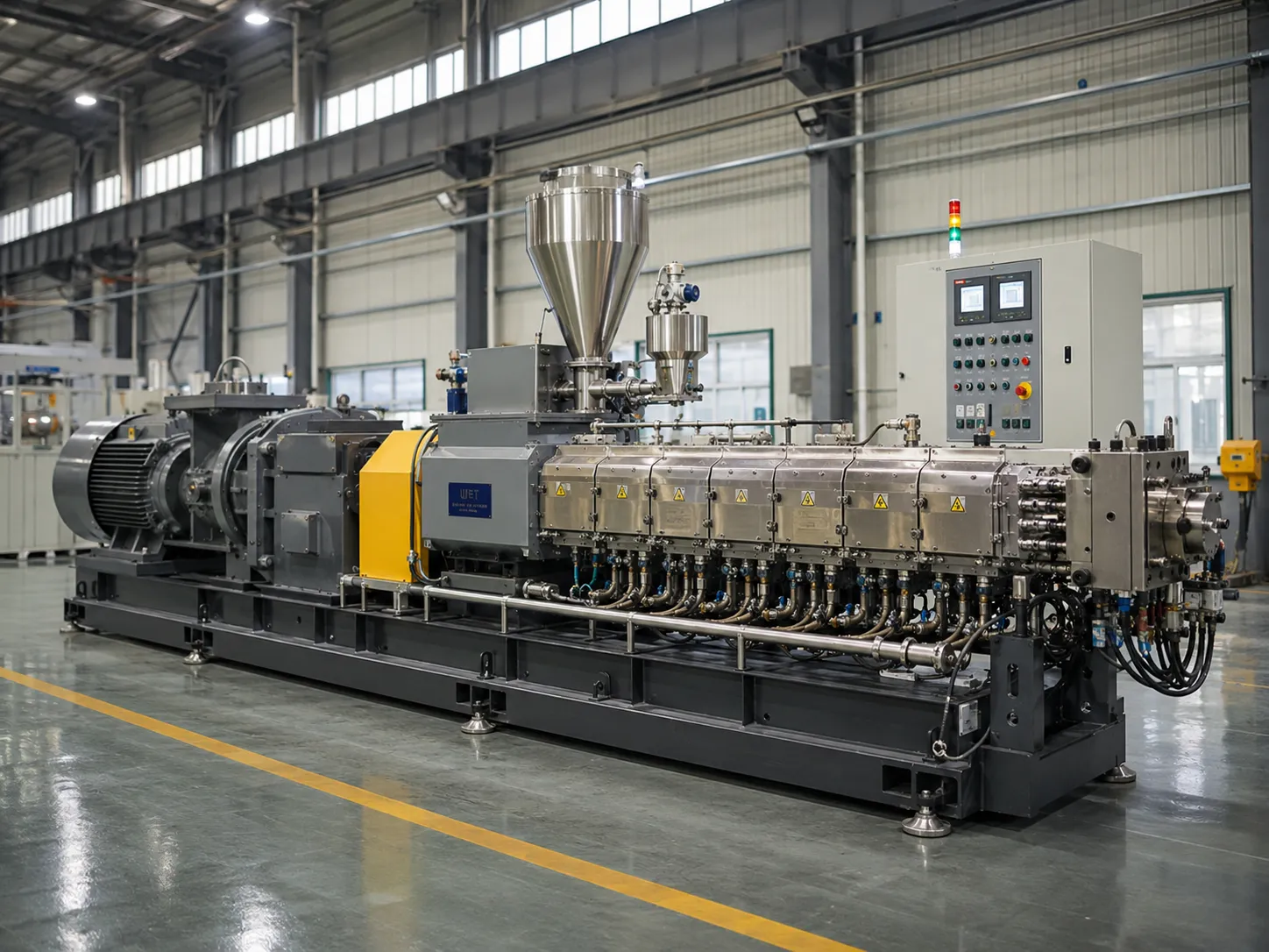 Industrial twin screw extruder machine with PLC control panel and multi-zone heating barrel in modern manufacturing facility